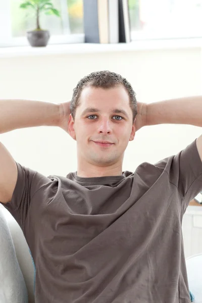 Sick man relaxing on the sofa — Stock Photo, Image