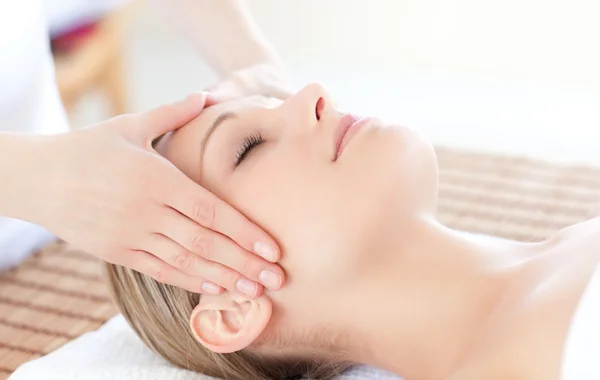 Close-up of a bright woman receiving a head massage — Stock Photo, Image