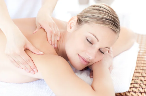 Beautiful woman receiving a back massage — Stock Photo, Image