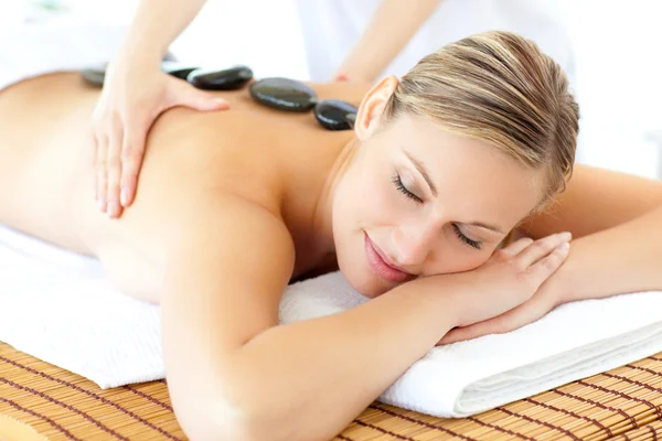 Sleeping woman having a massage — Stock Photo, Image