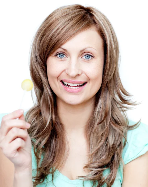 Beautiful woman holding a lollipop — Stock Photo, Image