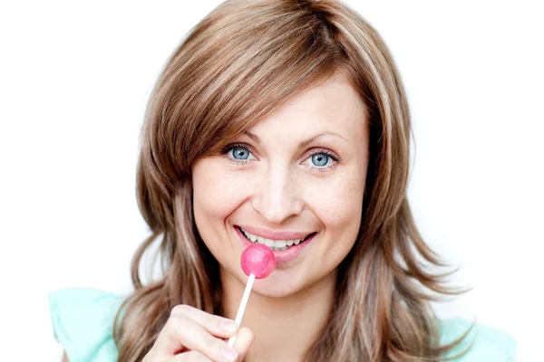 Attractive woman holding a lollipop — Stock Photo, Image