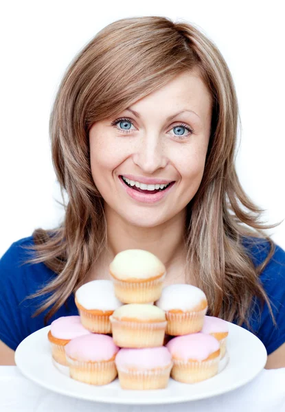Confident woman eating a cake — Stock Photo, Image