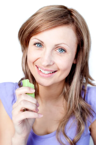 Beautiful woman eating celery — Stock Photo, Image