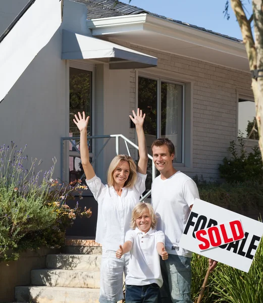 A family buying a house Stock Image