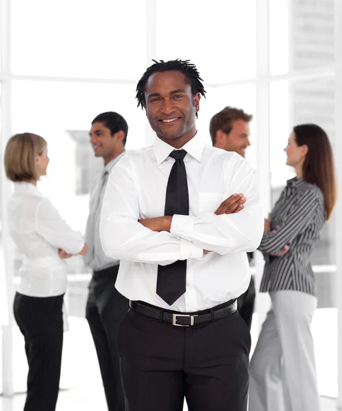Business ethnic leader with his team — Stock Photo, Image