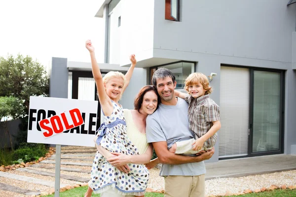 Family buying a house Royalty Free Stock Images