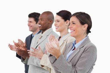 Side view of clapping salesteam standing together clipart