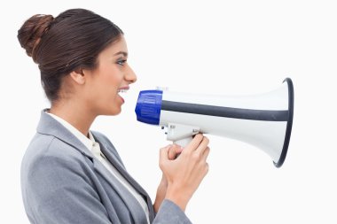 Side view of saleswoman using megaphone clipart