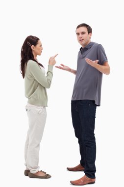 Man shrugged his shoulders is scolded by woman clipart