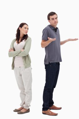 Man shrugged his shoulders back to back with woman clipart