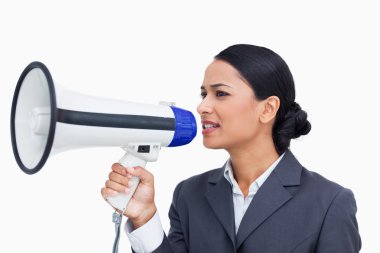 Close up of saleswoman using megaphone clipart