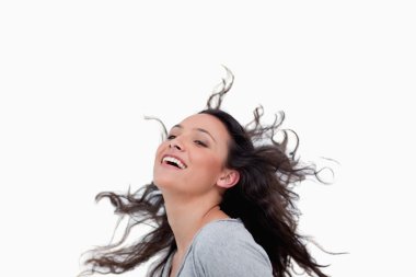 Smiling woman flipping her hair clipart