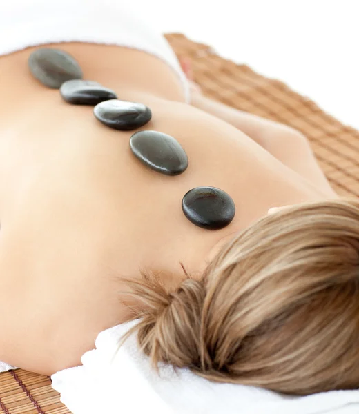 Relaxed woman lying on a massage table — Stock Photo, Image