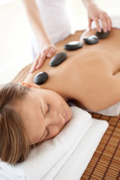 Calm woman lying on a massage table — Stock Photo, Image
