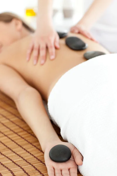 Close-up of a bright woman relaxing on a massage table — Stock Photo, Image