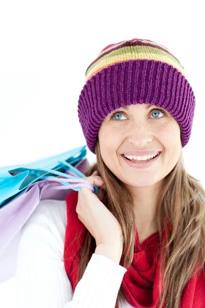 Mulher positiva segurando sacos de compras — Fotografia de Stock