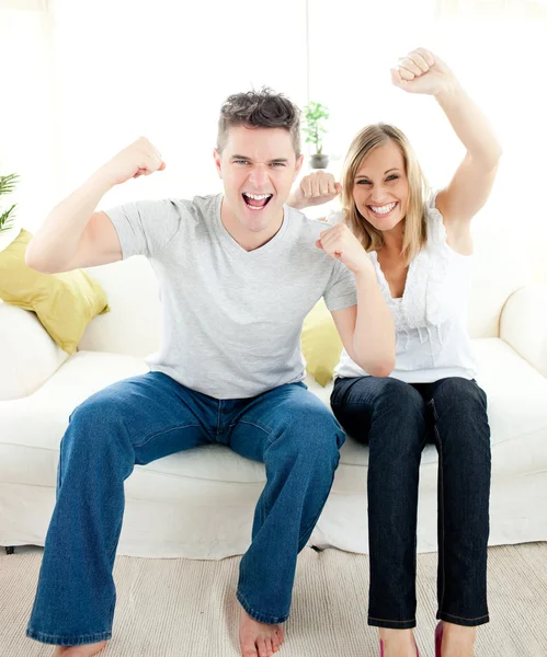 Charming couple punching the air — Stock Photo, Image