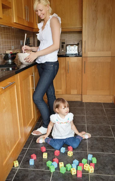 Smiling mother playing child — Stock Photo, Image