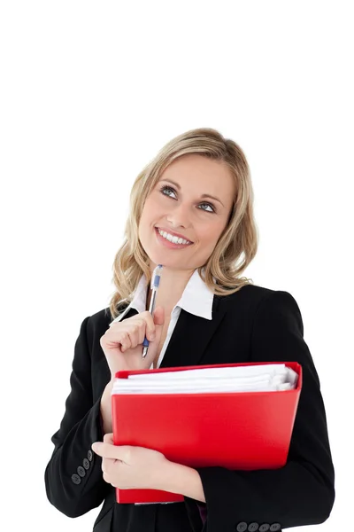 A thinking woman with a pen and a file in her hands — Stock Photo, Image