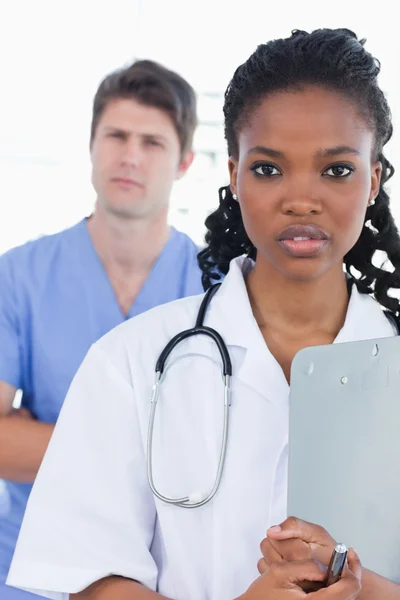 Portrait of serious doctors standing up — Stock Photo, Image