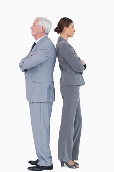 Businesspartner standing back to back — Stock Photo, Image