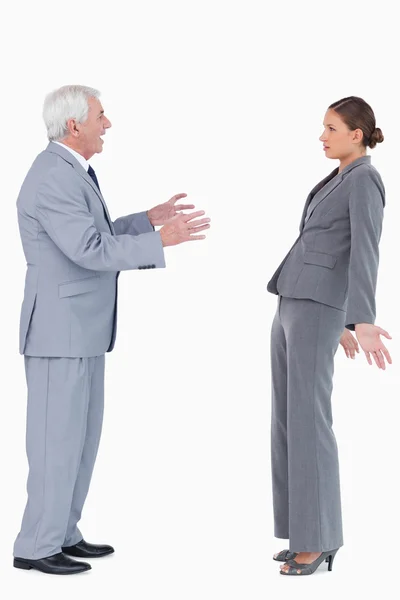 Businesswoman getting accused by colleague — Stock Photo, Image