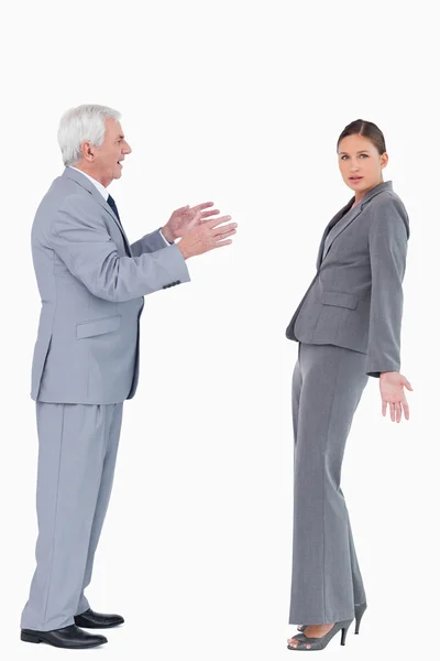 Businesswoman getting accused by colleague — Stock Photo, Image