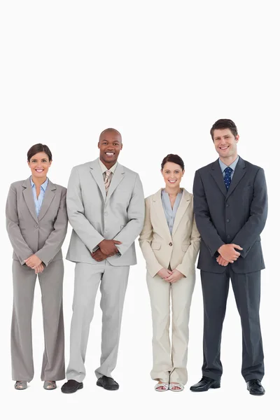 Smiling young businessteam standing together — Stock Photo, Image