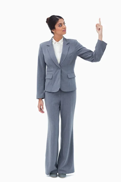 Saleswoman pointing up — Stock Photo, Image