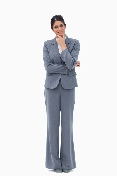 Mujer de negocios sonriente en pensamientos —  Fotos de Stock