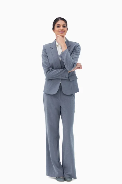 Smiling saleswoman in thoughts — Stock Photo, Image