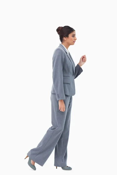 Side view of walking businesswoman — Stock Photo, Image