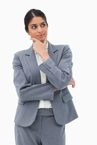 Denkende Geschäftsfrau, die zur Seite schaut — Stockfoto