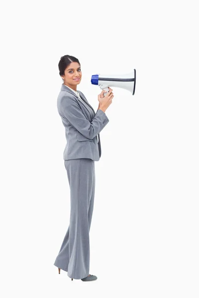 Vista lateral da mulher de negócios com megafone — Fotografia de Stock