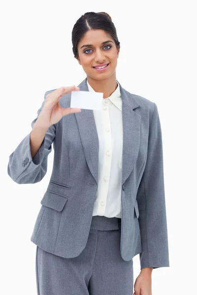 Smiling saleswoman presenting blank business card — Stock Photo, Image