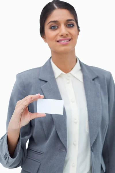 Tradeswoman showing blank business card — Stock Photo, Image