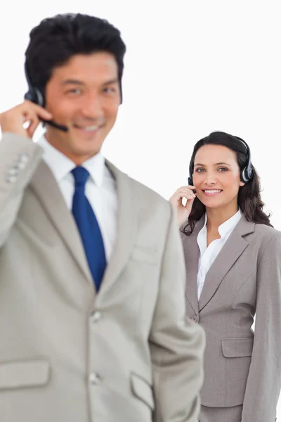 Smiling customer support employees — Stock Photo, Image