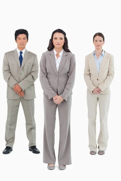 Businesswoman with her team behind her — Stock Photo, Image