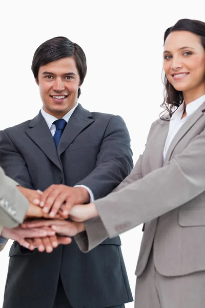 Young businessteam putting hands together — Stock Photo, Image