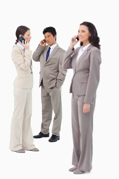 Salespeople on their cellphones — Stock Photo, Image