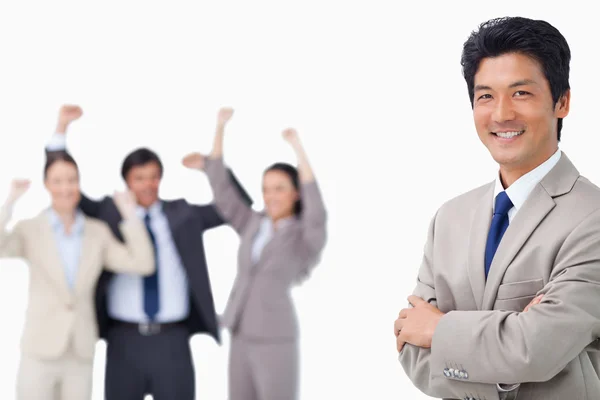 Successful salesman getting celebrated by colleagues — Stock Photo, Image