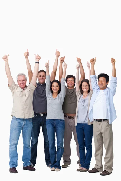Sorrindo grupo de amigos dando polegares para cima — Fotografia de Stock