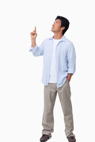 Male pointing and looking up — Stock Photo, Image