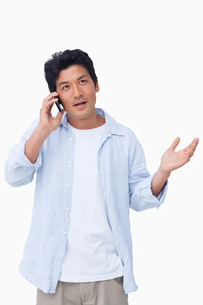 Clueless male on his cellphone — Stock Photo, Image