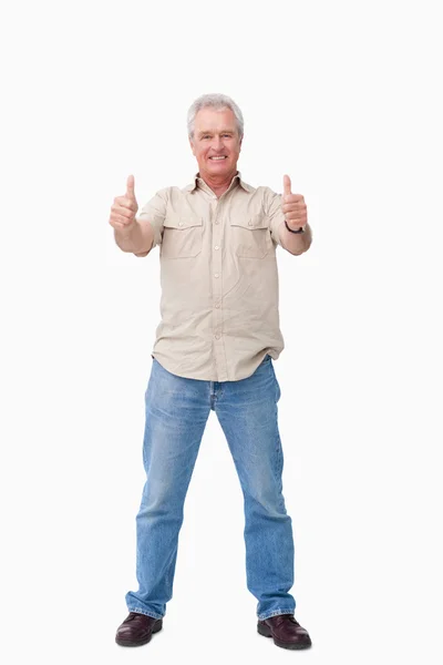 Mature male giving thumbs up — Stock Photo, Image