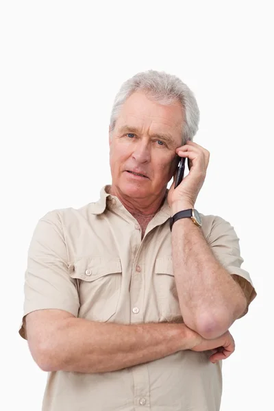 Mature man with his cellphone — Stock Photo, Image