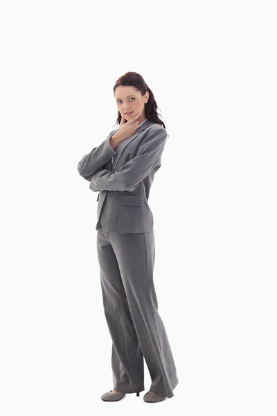 Профіль бізнес-леді з рукою на підборідді — стокове фото