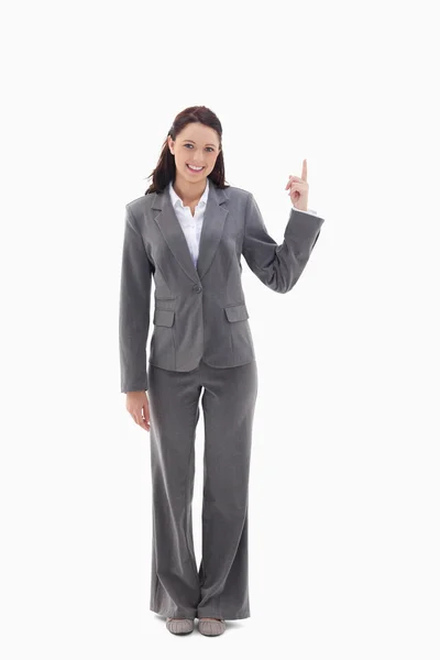 Businesswoman smiling and presenting a product on the top — Stock Photo, Image