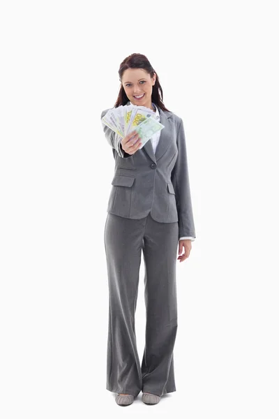 Empresária feliz com muitas notas bancárias na mão — Fotografia de Stock